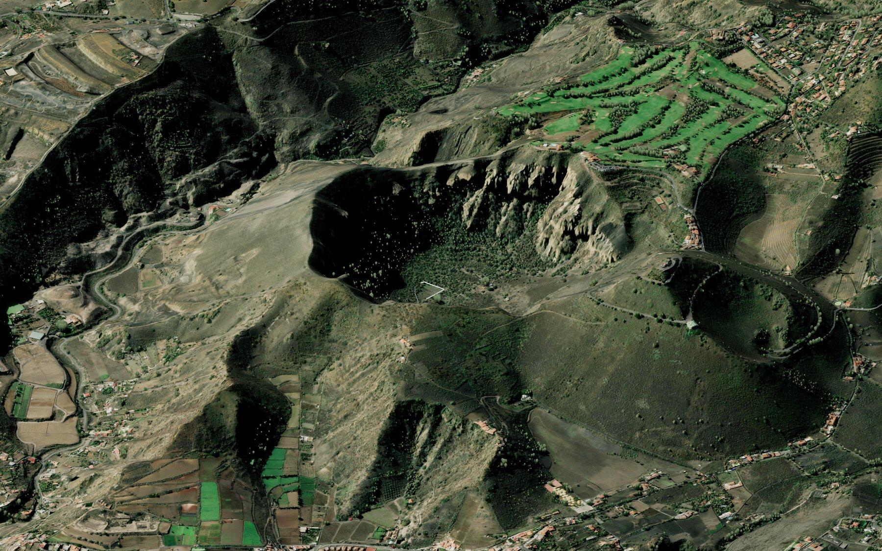 3D terrain model with satellite imagery draped over a mountain valley